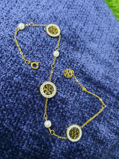 Elegant Tory Round Stainless Steel Earrings for Women | Modern shine, timeless charm - Mux E Mart